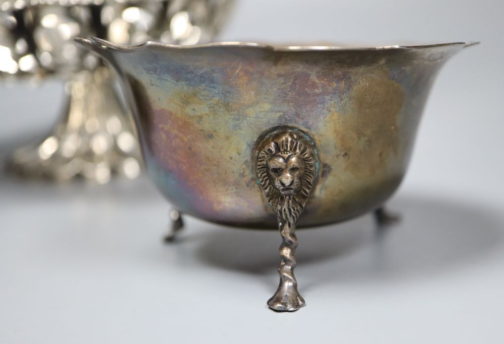 A pierced and embossed silver footed bowl, maker C.C, Chester 1907 and two silver sugar bowls, approx 13oz
